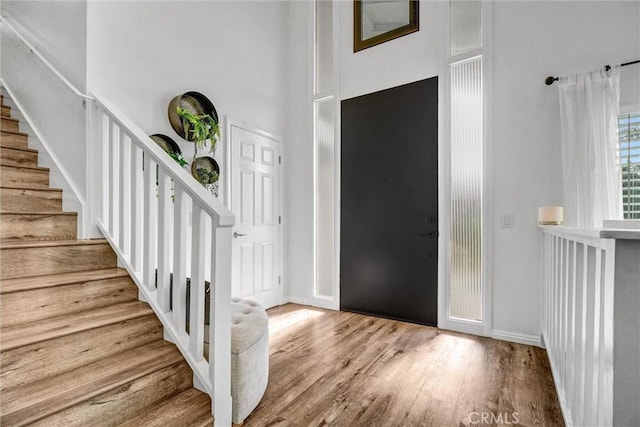 1836 Macinnes Pl, Placentia, CA 92870 - foyer with stairs, wood finished floors, baseboards, and a high ceiling