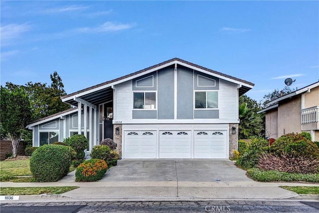 1836 Macinnes Pl, Placentia, CA 92870 - view of front facade with an attached garage, driveway, and stucco siding