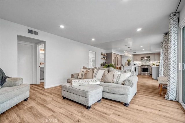 1836 Macinnes Pl, Placentia, CA 92870 - living room featuring light wood finished floors, recessed lighting, and baseboards
