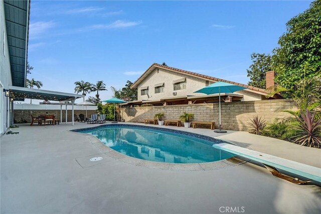 1836 Macinnes Pl, Placentia, CA 92870 - view of pool with a patio, a fenced backyard, and a diving board