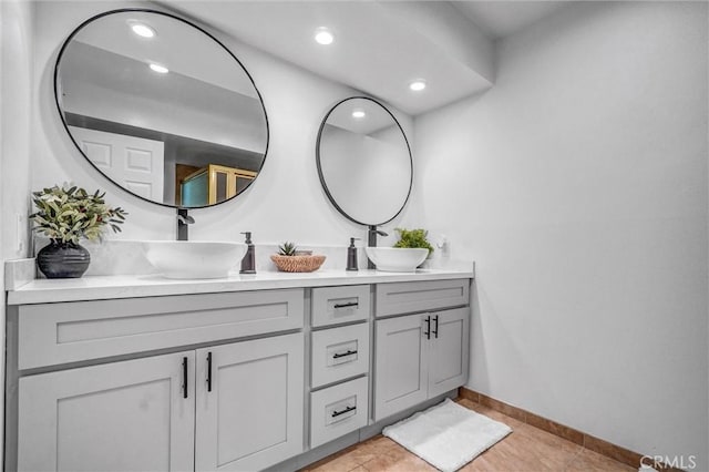 1836 Macinnes Pl, Placentia, CA 92870 - bathroom featuring baseboards, double vanity, recessed lighting, and tile patterned flooring