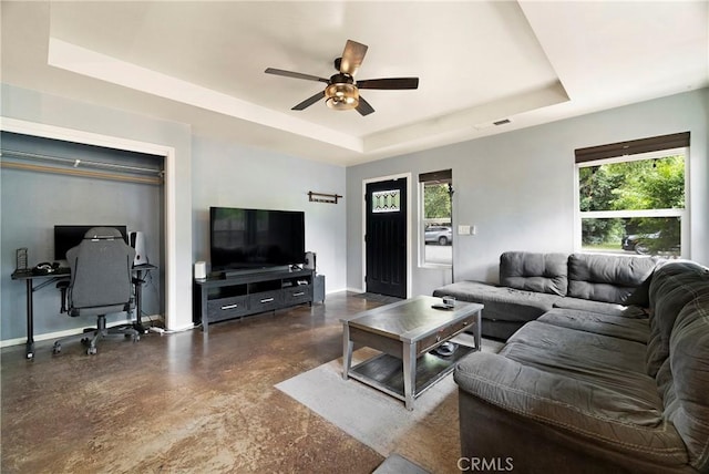 1274 Humboldt Ave, Chico, CA 95928 - living area with a raised ceiling, concrete floors, a ceiling fan, and baseboards