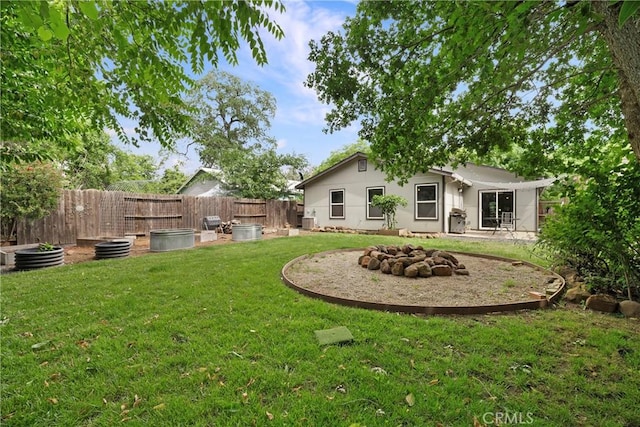 1274 Humboldt Ave, Chico, CA 95928 - view of yard with an outdoor fire pit and a patio