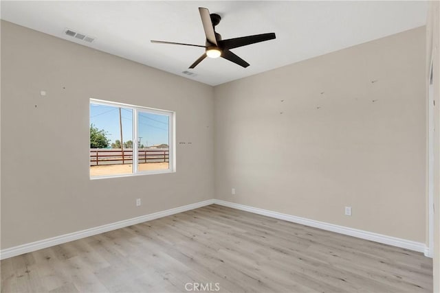 21192 Zuni Rd, Apple Valley, CA 92307 - empty room featuring light wood-style flooring, baseboards, and a ceiling fan