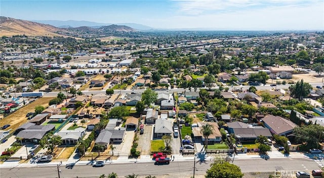 6916 36th St, Jurupa Valley, CA 92509 - aerial perspective of suburban area featuring a mountainous background