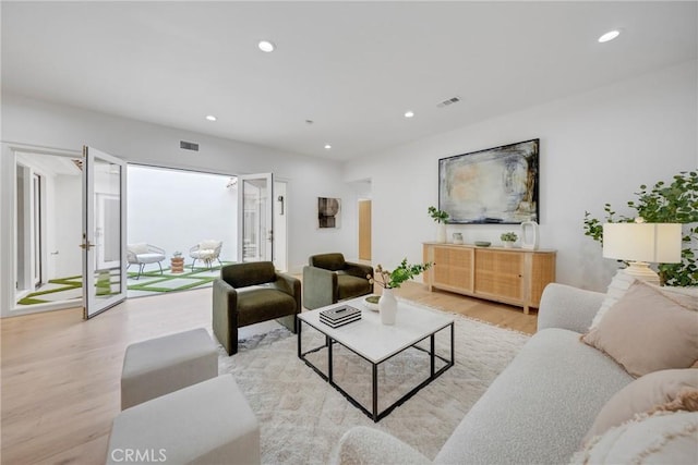 80 Seton Rd, Irvine, CA 92612 - living area featuring wood finished floors and recessed lighting
