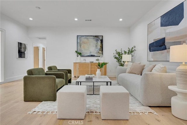 80 Seton Rd, Irvine, CA 92612 - living room with wood finished floors, recessed lighting, and baseboards