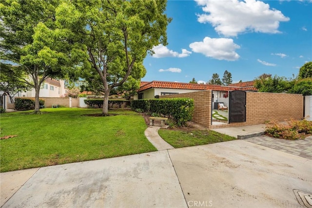 80 Seton Rd, Irvine, CA 92612 - view of front of home featuring a gate, a tile roof, and stucco siding