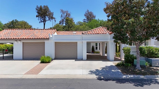 4547 Cordoba Way, Oceanside, CA 92056 - mediterranean / spanish house featuring stucco siding, a tiled roof, a garage, and concrete driveway