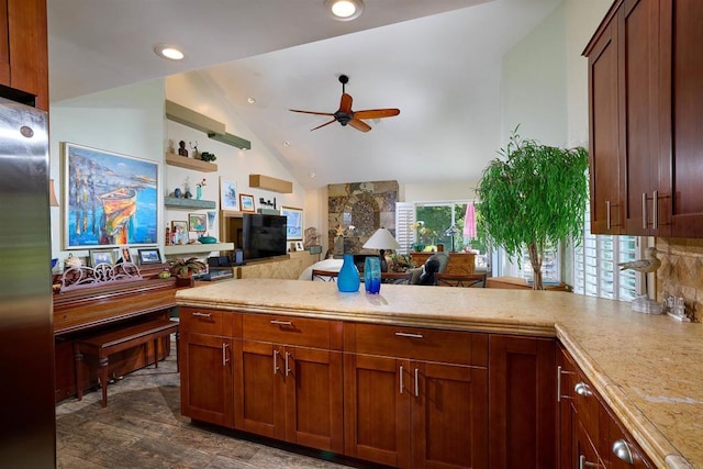 4547 Cordoba Way, Oceanside, CA 92056 - kitchen featuring a ceiling fan, light countertops, vaulted ceiling, a peninsula, and dark wood-type flooring