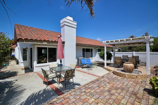 4547 Cordoba Way, Oceanside, CA 92056 - back of property with a tile roof, outdoor dining space, a patio, a chimney, and stucco siding