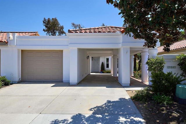 4547 Cordoba Way, Oceanside, CA 92056 - mediterranean / spanish-style home with a tiled roof, driveway, an attached garage, and stucco siding