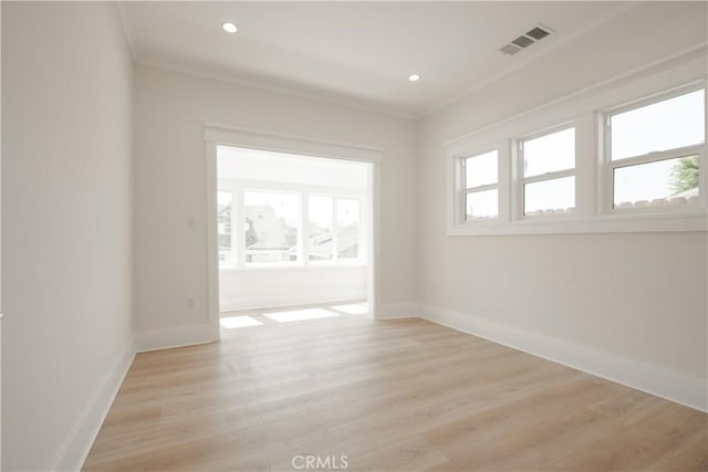 247 S Benton Way, Los Angeles, CA 90057 - spare room with light wood finished floors, baseboards, crown molding, and recessed lighting