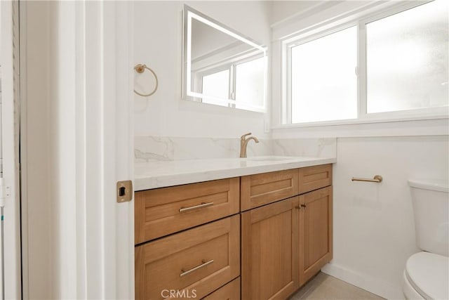 247 S Benton Way, Los Angeles, CA 90057 - bathroom with toilet, vanity, and baseboards