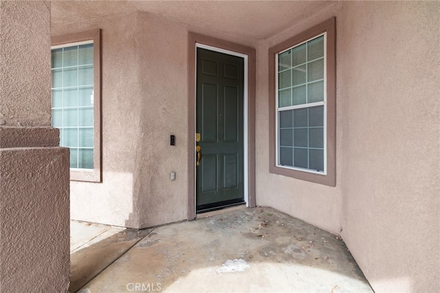 9011 Honeysuckle Ave, Hesperia, CA 92344 - view of exterior entry with stucco siding