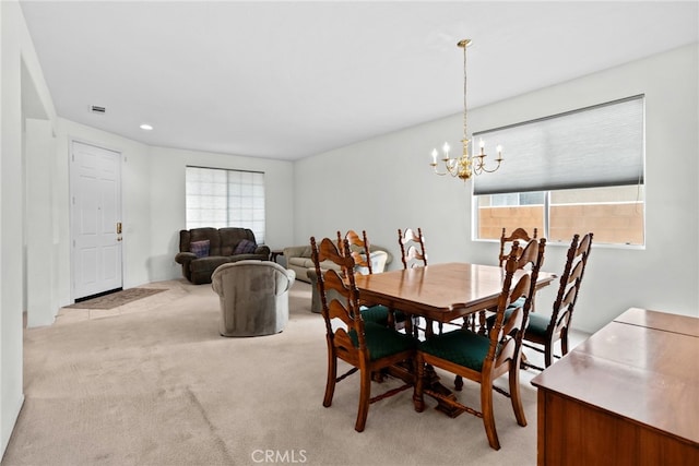 9011 Honeysuckle Ave, Hesperia, CA 92344 - dining space with light carpet, a chandelier, and recessed lighting