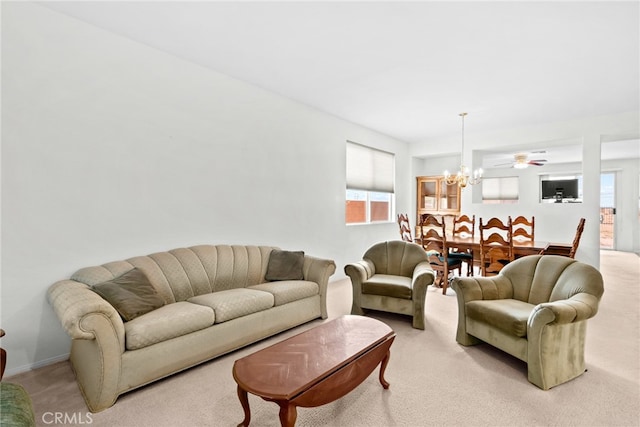 9011 Honeysuckle Ave, Hesperia, CA 92344 - living area with light carpet, a chandelier, and healthy amount of natural light