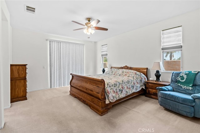 9011 Honeysuckle Ave, Hesperia, CA 92344 - bedroom featuring light colored carpet and a ceiling fan