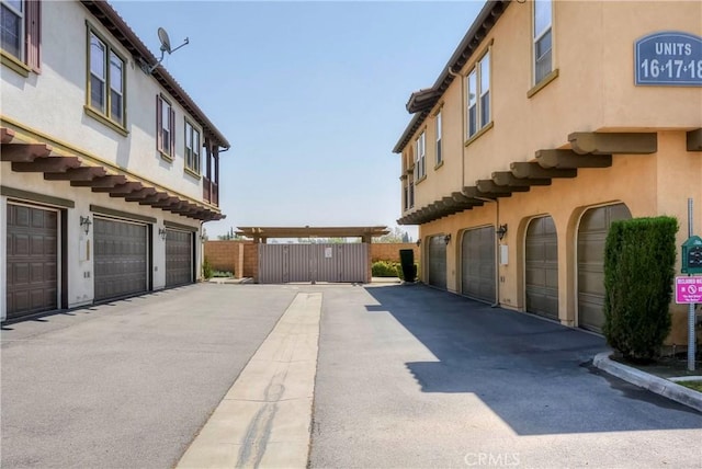 2750E Oak Hill Dr Unit 16, Ontario, CA 91761 - view of asphalt driveway