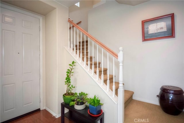 2750E Oak Hill Dr Unit 16, Ontario, CA 91761 - staircase featuring baseboards