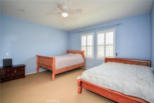 2750E Oak Hill Dr Unit 16, Ontario, CA 91761 - carpeted bedroom with baseboards and ceiling fan