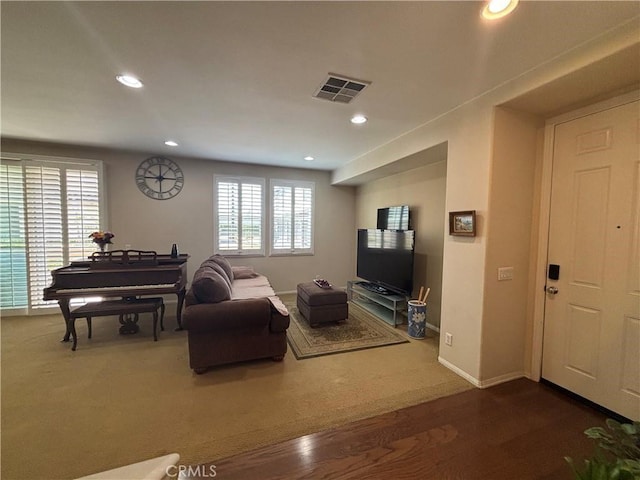 2750E Oak Hill Dr Unit 16, Ontario, CA 91761 - carpeted living area with recessed lighting, wood finished floors, and baseboards