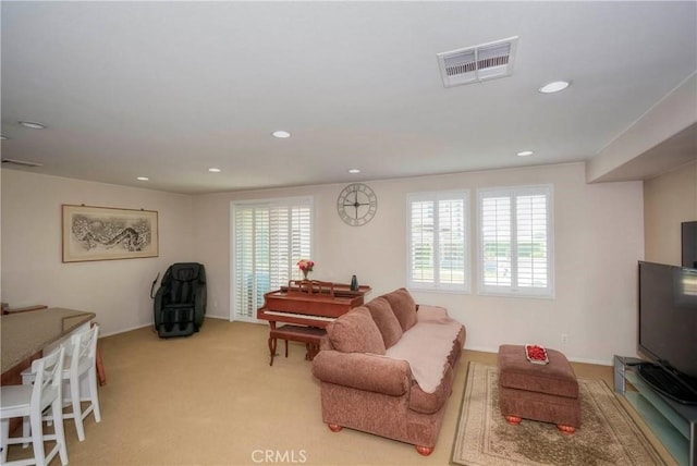 2750E Oak Hill Dr Unit 16, Ontario, CA 91761 - living room with plenty of natural light, recessed lighting, light colored carpet, and baseboards