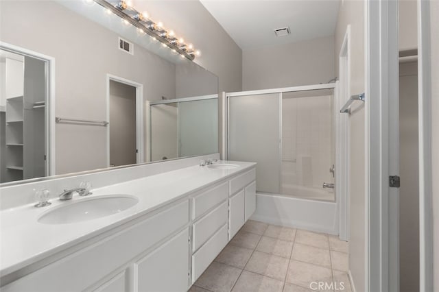 170 Valley View Ter, Mission Viejo, CA 92692 - full bath featuring double vanity, bath / shower combo with glass door, and tile patterned flooring
