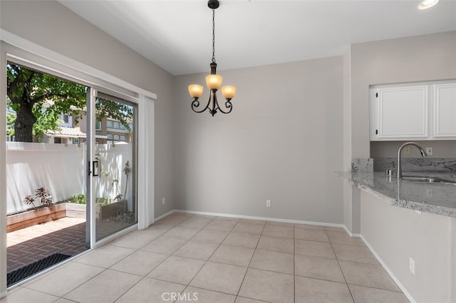 170 Valley View Ter, Mission Viejo, CA 92692 - unfurnished dining area with a sink, a chandelier, baseboards, and light tile patterned flooring