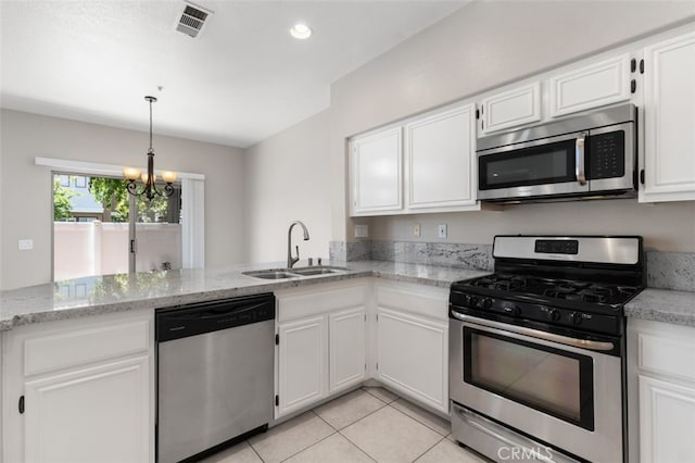 170 Valley View Ter, Mission Viejo, CA 92692 - kitchen featuring stainless steel appliances, a sink, white cabinetry, and recessed lighting