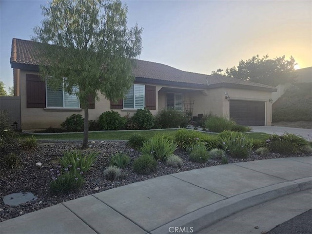 108 Mesa Ct, Calimesa, CA 92320 - single story home featuring a garage, a tiled roof, stucco siding, and driveway
