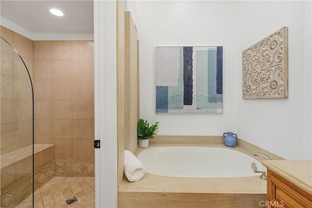 123 Costa Brava, Laguna Niguel, CA 92677 - bathroom featuring a garden tub, vanity, tiled shower, and recessed lighting