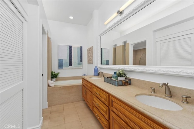 123 Costa Brava, Laguna Niguel, CA 92677 - bathroom with tile patterned floors, double vanity, a bathtub, and recessed lighting
