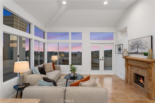 123 Costa Brava, Laguna Niguel, CA 92677 - living room with french doors, a fireplace, high vaulted ceiling, and recessed lighting