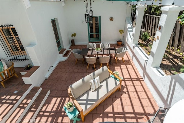balcony featuring a patio area and outdoor dining space