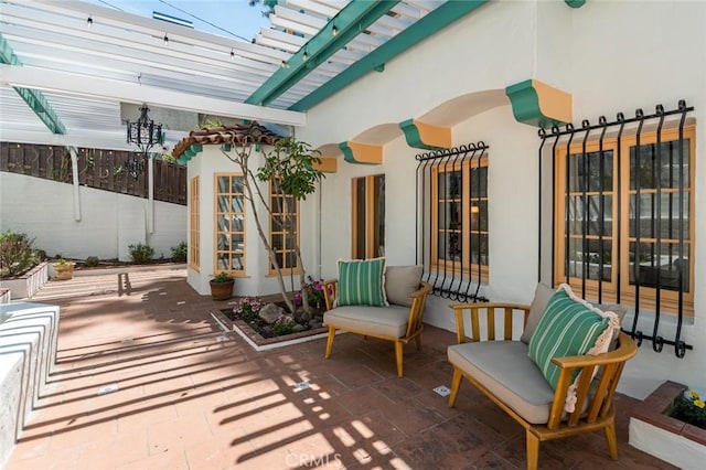 view of patio featuring a pergola