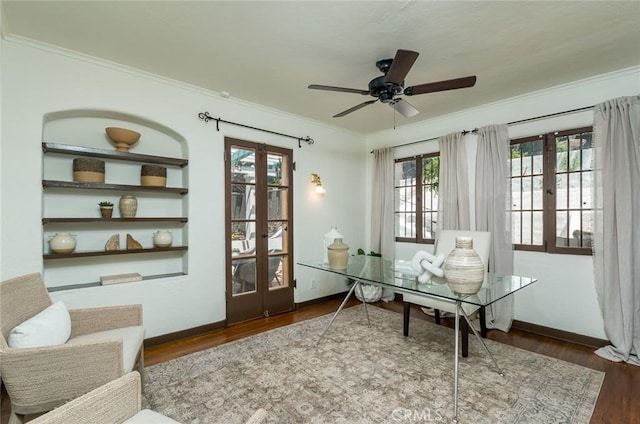office featuring french doors, ornamental molding, wood finished floors, plenty of natural light, and ceiling fan