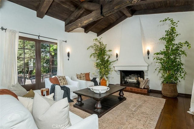 living room with wooden ceiling, hardwood / wood-style floors, and a fireplace