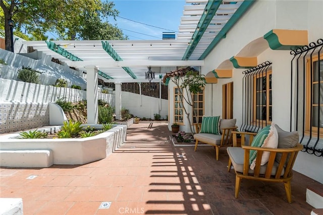 view of patio with fence and a pergola