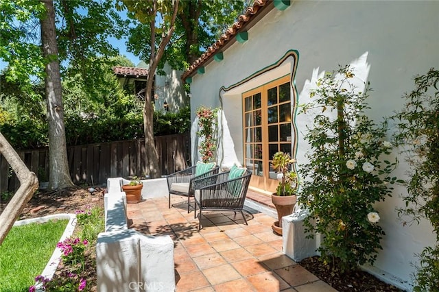 view of patio / terrace with fence