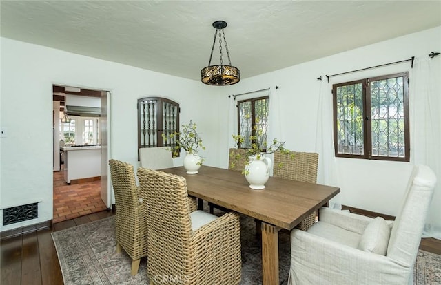 dining space featuring hardwood / wood-style floors