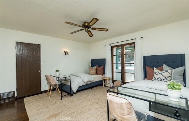 bedroom featuring wood finished floors and ceiling fan