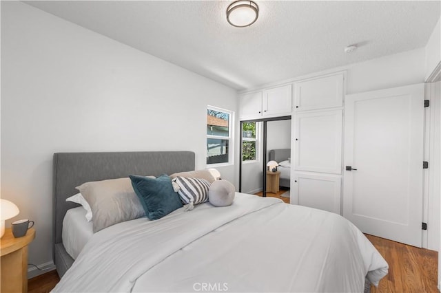 1905 Boca Ave, Los Angeles, CA 90032 - bedroom featuring wood finished floors and a textured ceiling