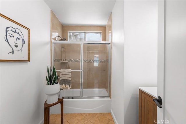 1905 Boca Ave, Los Angeles, CA 90032 - full bath featuring bath / shower combo with glass door, vanity, baseboards, and tile patterned flooring