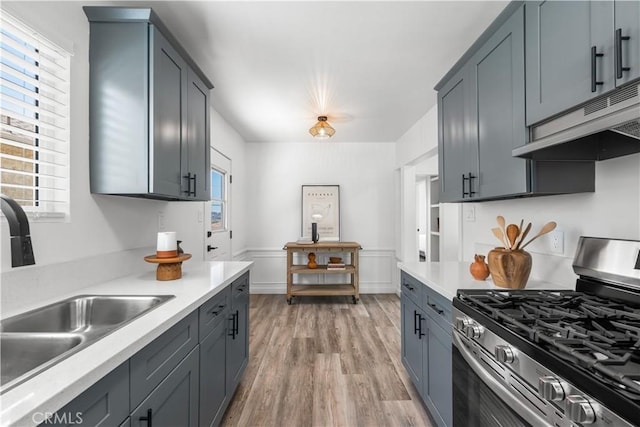 1905 Boca Ave, Los Angeles, CA 90032 - kitchen with gas stove, a sink, light countertops, and light wood-type flooring