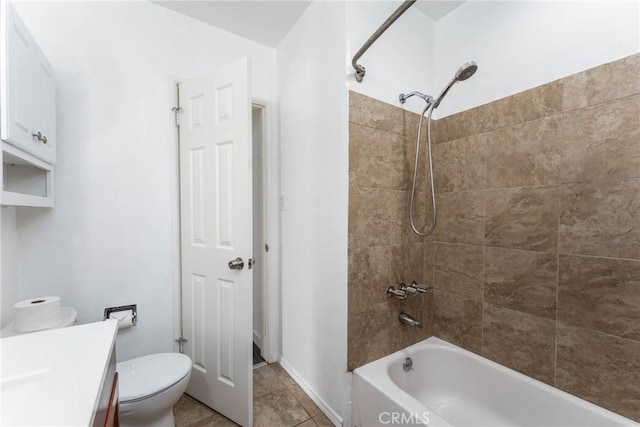 14027 Wyandotte St, Van Nuys, CA 91405 - full bath with vanity,  shower combination, tile patterned flooring, toilet, and baseboards