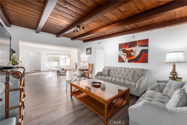 14027 Wyandotte St, Van Nuys, CA 91405 - living room with wooden ceiling, beamed ceiling, and wood finished floors