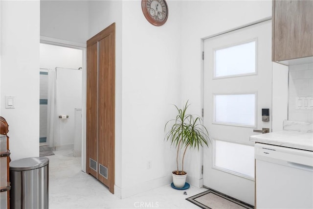 14027 Wyandotte St, Van Nuys, CA 91405 - doorway with light marble finish floors and baseboards