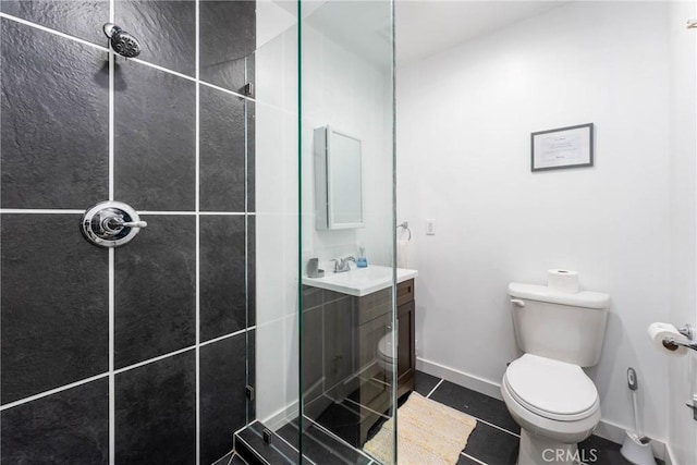 14027 Wyandotte St, Van Nuys, CA 91405 - full bath featuring toilet, a shower stall, tile patterned floors, and vanity