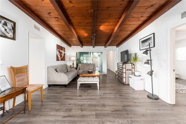 14027 Wyandotte St, Van Nuys, CA 91405 - living room featuring beam ceiling, wood ceiling, and light wood-style floors